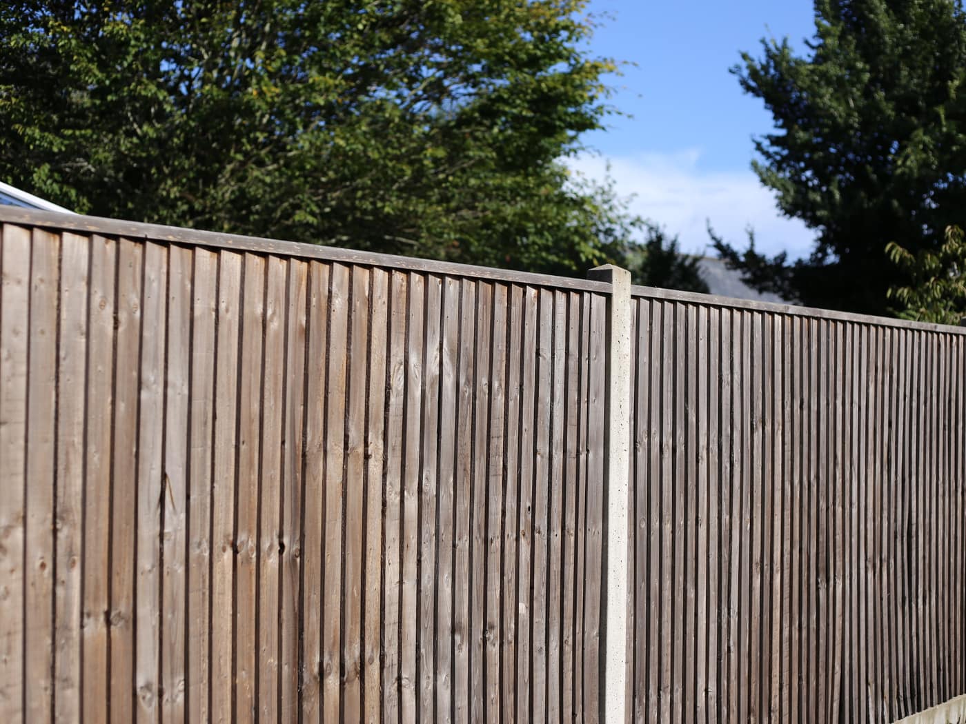Closeboard fence with concrete posts
